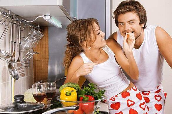 A woman feeds a man potency drugs